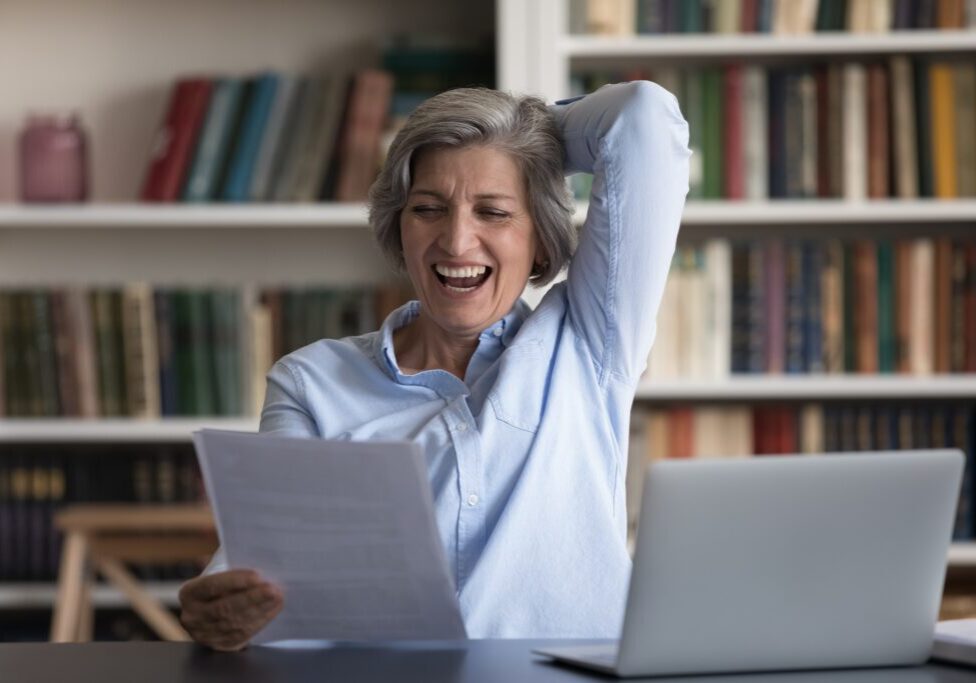 a Cheerful Business woman Reading Document